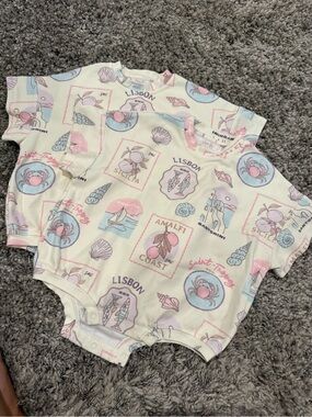 Cream Baby One-Piece Bodysuit with Pastel Travel Print